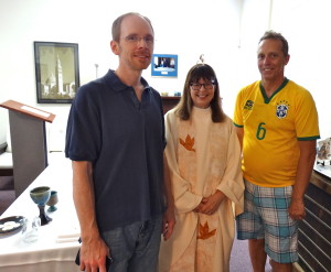 Acolyte and Leader of Song Chris Hinkle (L), Rev. Ann Penick, and Allen Rose, Chairman of the D/W Ad Hoc Committee on Women Presiders before celebrating Mass and leading a community discussion at the Dignity Center on June 28.